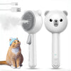 A white rechargeable pet grooming brush with a fine water spray is shown next to a domestic cat.