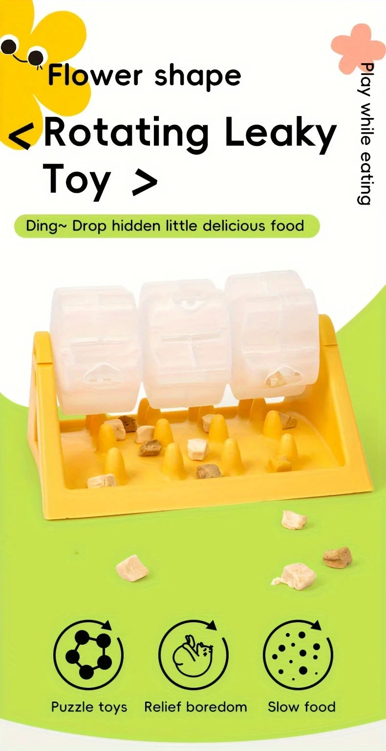 Gelbes Puzzlespielzeug zum Füttern mit blütenförmigen, rotierenden Blattfutterstücken.
