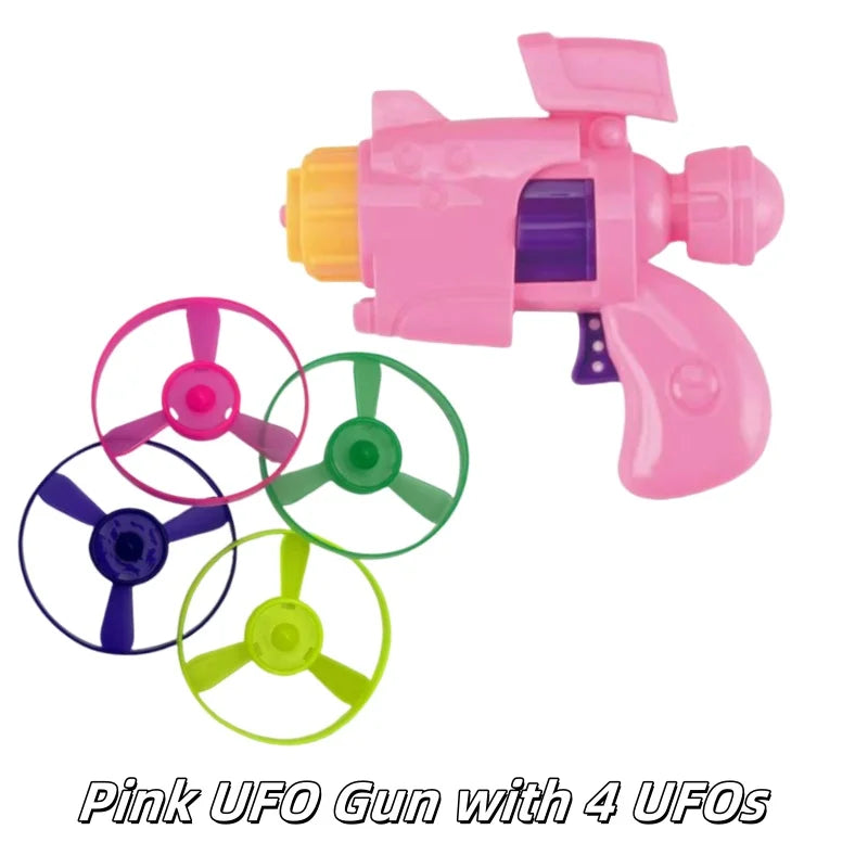 Pink UFO gun toy with four replacement UFO discs