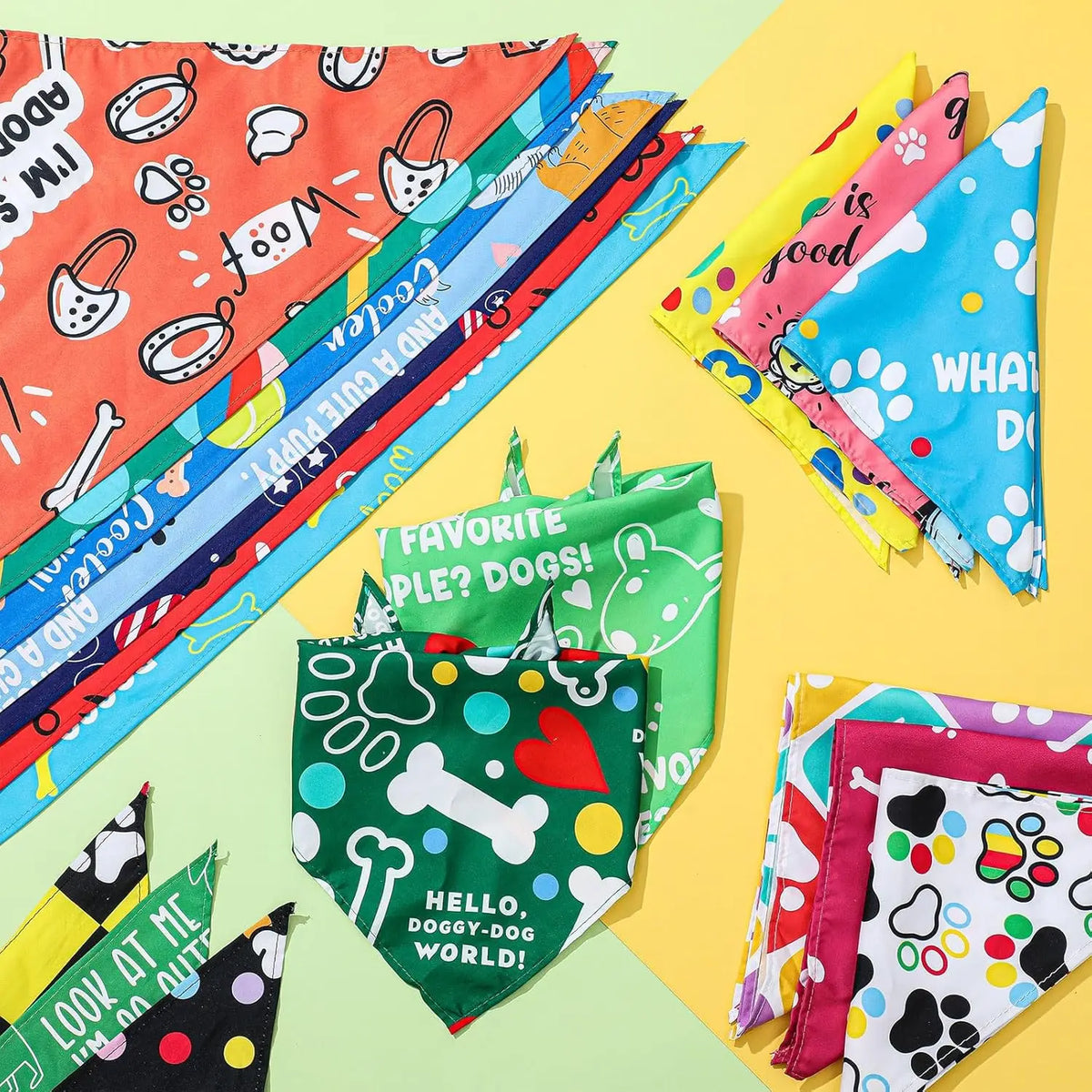 A colorful assortment of 100 dog and cat bandanas featuring various patterns and designs.