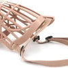 A beige adjustable anti-bite dog muzzle with a woven mesh design and quick-release buckle.