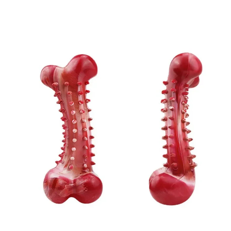 A bright red natural rubber dog chew toy for teeth cleaning and training.