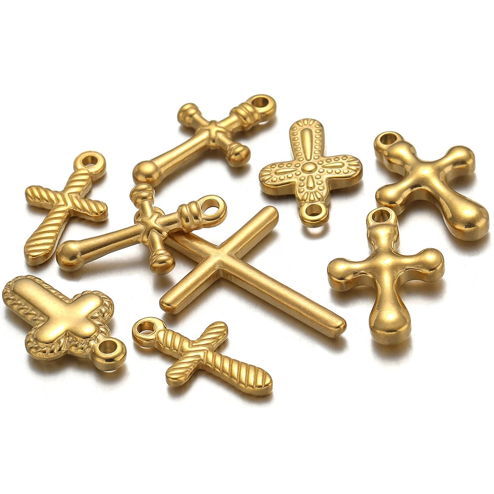 A set of vintage gold-toned cross charms for DIY jewelry making