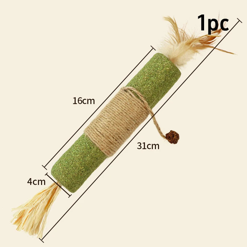 A long, cylindrical catnip chew stick with a sisal rope and fluffy tassels is shown against a light background.