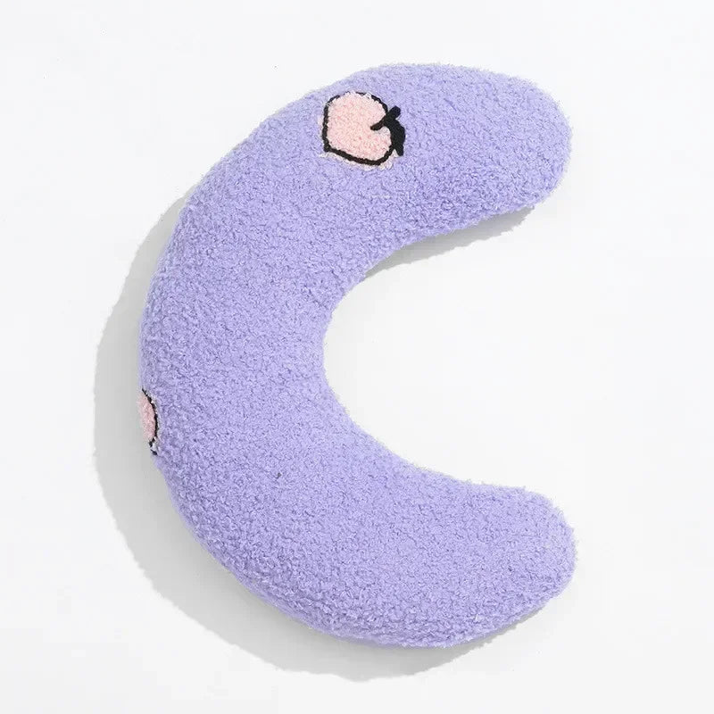 A soft lavender U-shaped cat sleeping pillow with pink embroidered details.