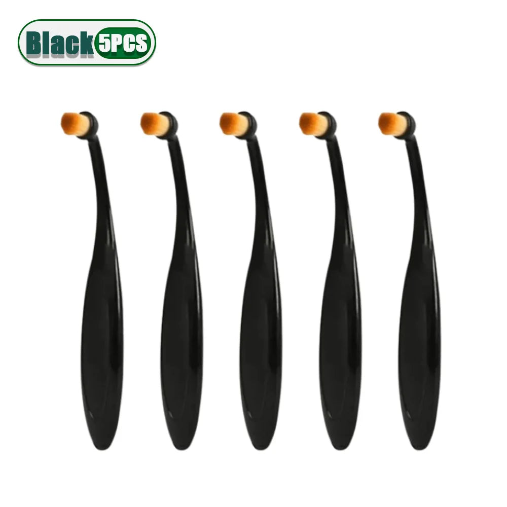 Five black pet tear stain remover brushes with orange tips for dogs and cats