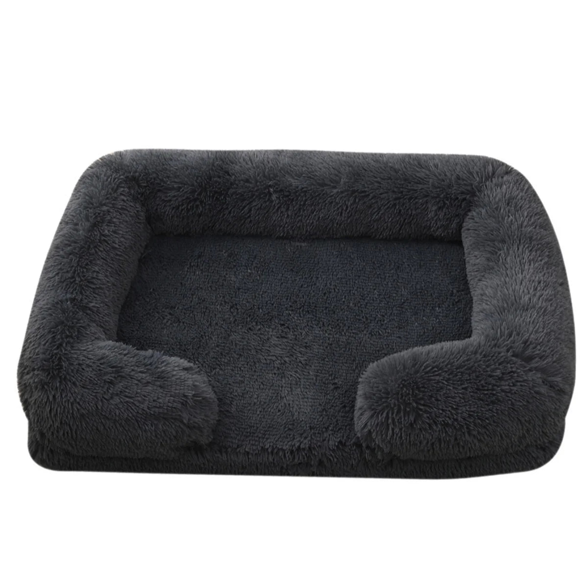 A dark gray orthopedic plush dog bed with a raised bolster.
