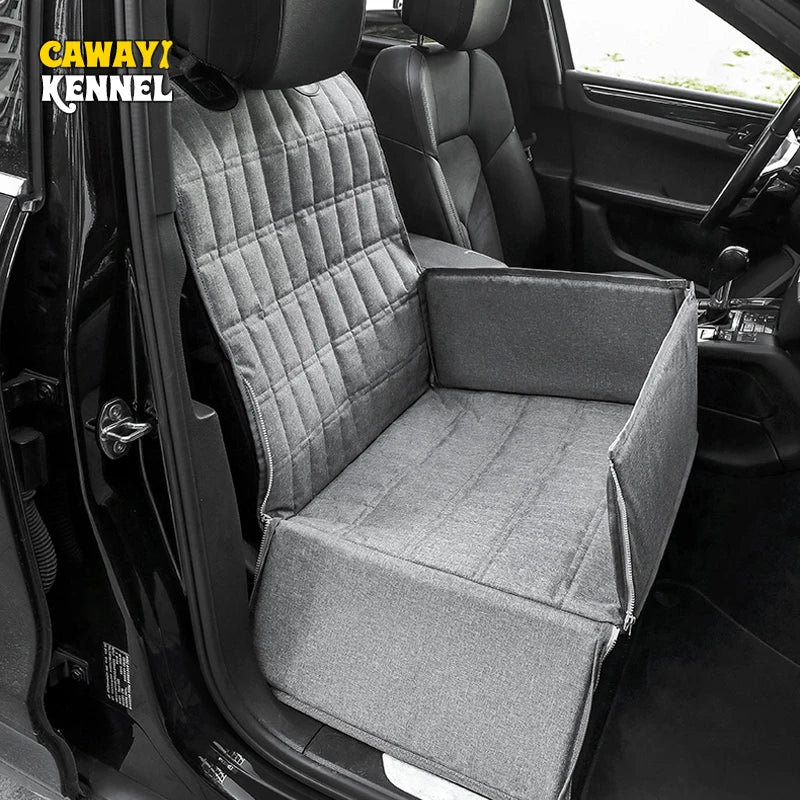 A black waterproof dog car seat hammock installed in the rear door of a vehicle.