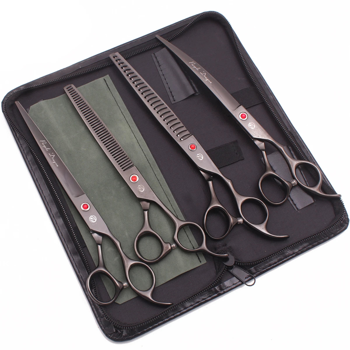 A black case holding a pair of professional stainless steel pet grooming scissors and a green cloth.