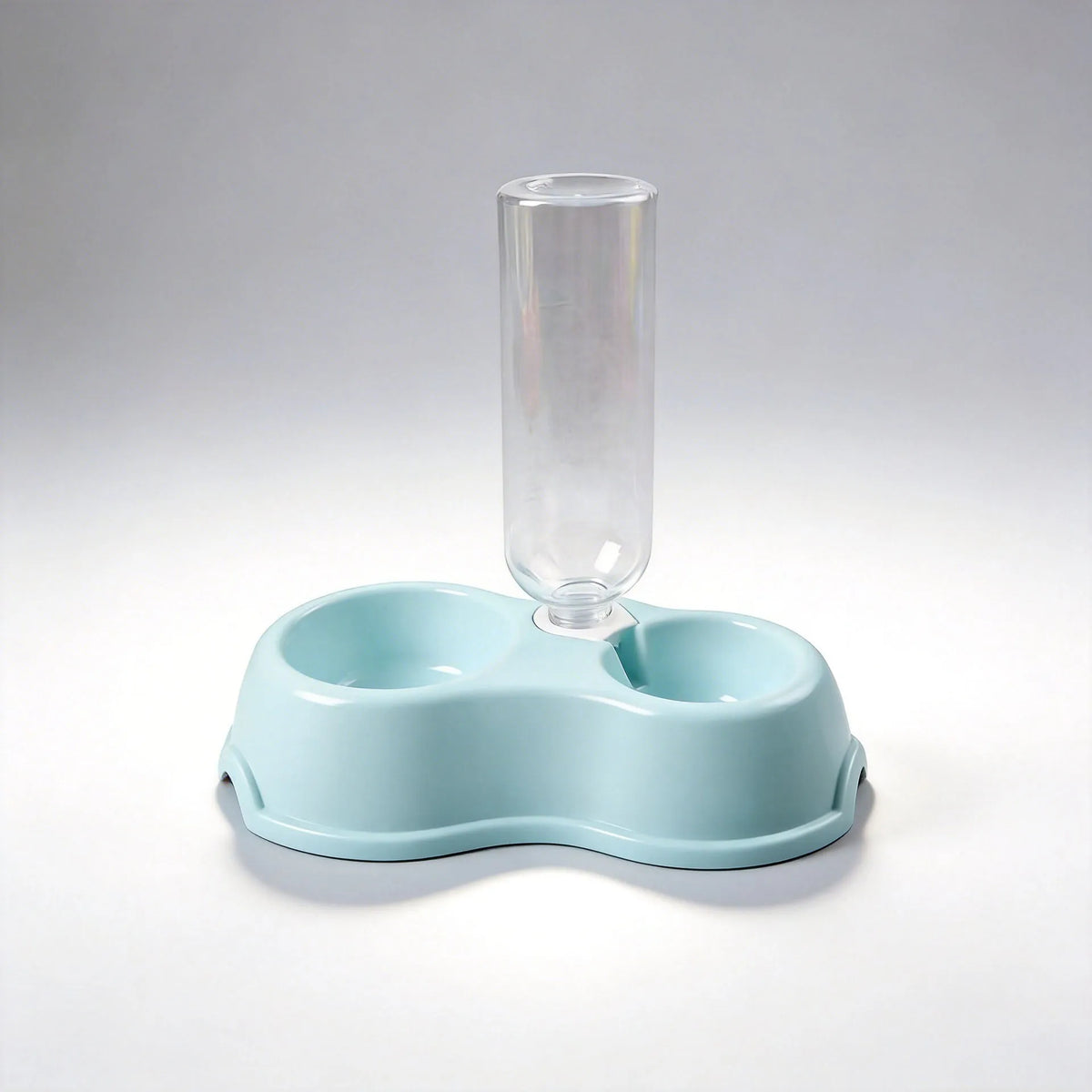 A clear glass feeder with a light blue dual-bowl base for cat and dog food and water.