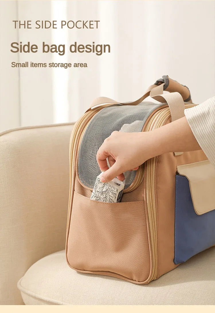 A hand is accessing the side pocket of a tan backpack designed for small pets, showing a storage area.