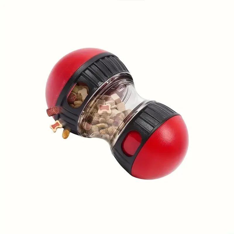 A red and black interactive slow feeder dog toy with a clear dispenser for dry snacks.