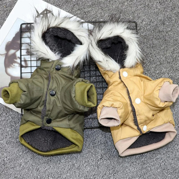 A pair of cozy hooded winter jackets for small dogs, one olive green and one tan, displayed on a black wire grid.