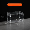A clear acrylic reptile terrarium box with mesh screening and a black lid shown on a dark surface.