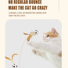 A cat is mid-air batting at a feather elastic ball, demonstrating a bounce.