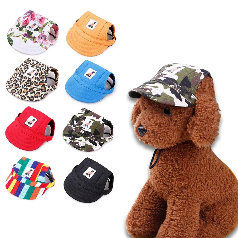 A collection of various pet grooming and fashion visor caps for dogs and cats in floral, solid colors, camouflage, and stripe