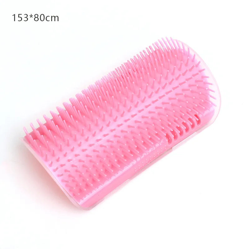 A pink silicone massage brush with numerous fine bristles shown from above.