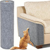 A fluffy orange cat is sitting on a beige sofa next to a cylindrical gray furniture protector.