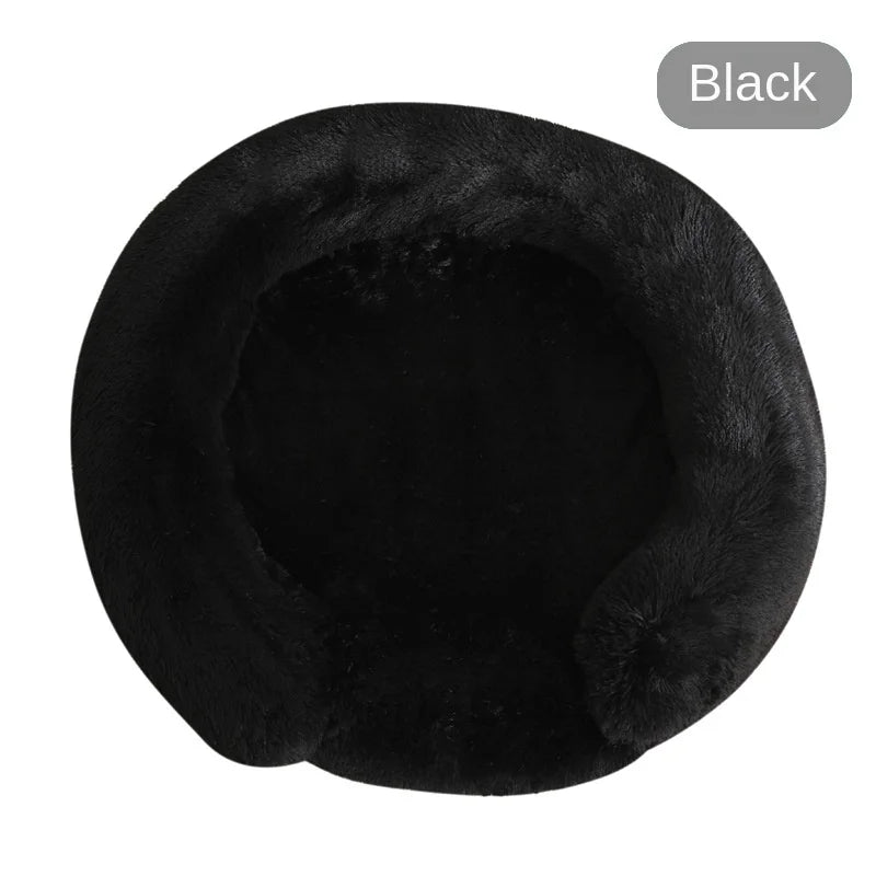 A round, black, ultra-soft dog bed with removable cover shown from the top view.