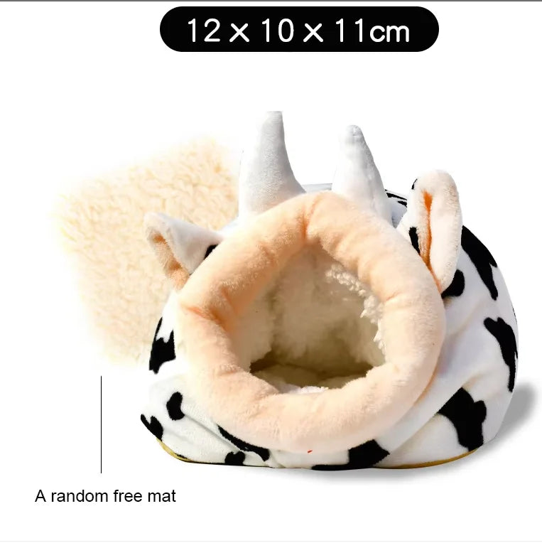 Columpio para mascotas de forro polar blanco y negro con interior suave y esponjoso.