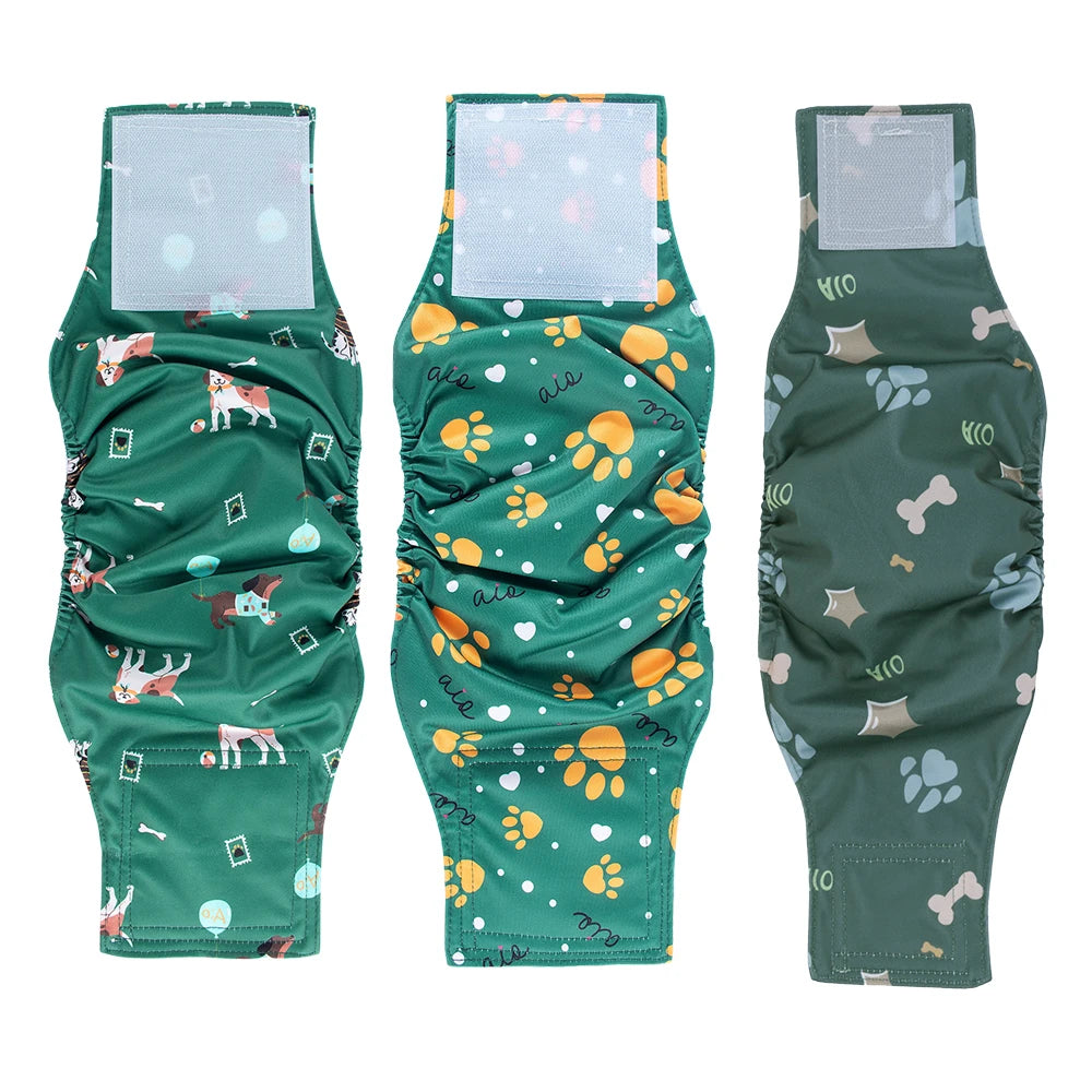 Reusable dog belly bands in green fabric with various paw print and bone designs for training and protection