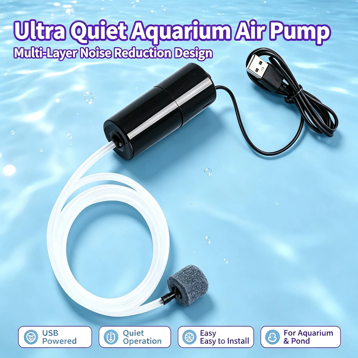 A black USB powered aquarium air pump with a white hose and a gray noise reduction cover is shown on a blue surface.