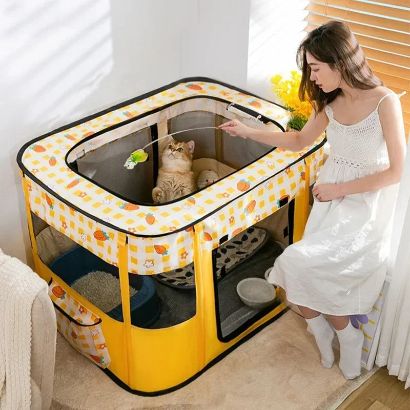 A woman is interacting with a yellow folding cat tent bed for a cat inside, featuring a plush mat.