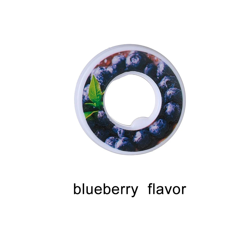 A round flavor pod for water bottles with a blueberry scent and a green leaf detail.