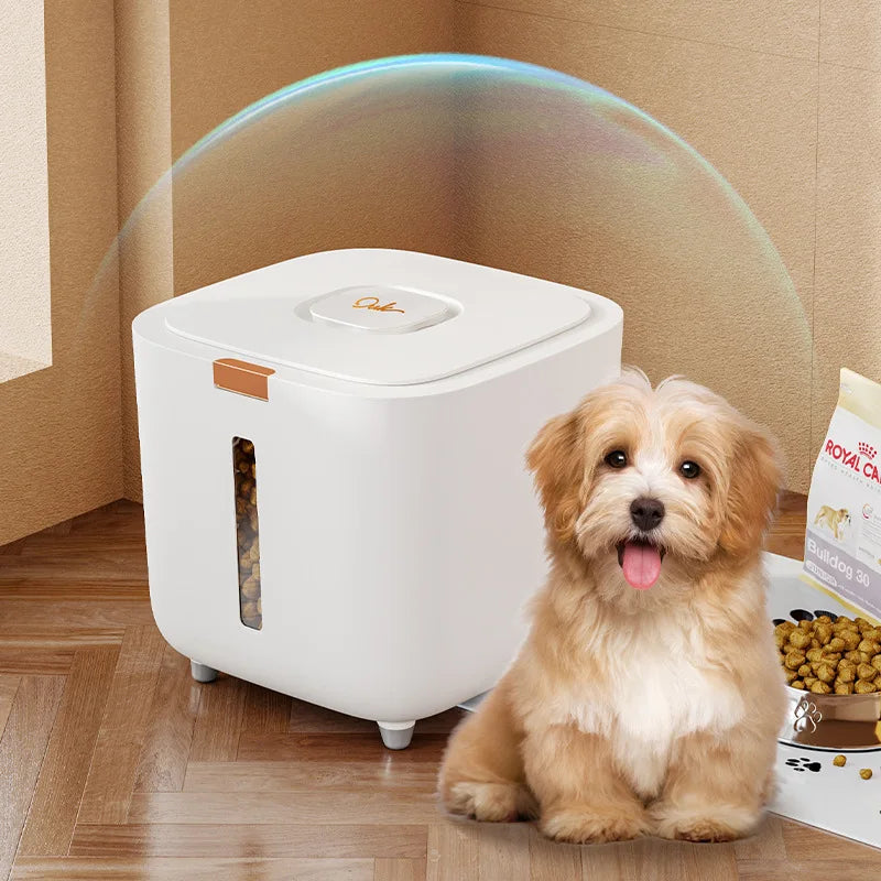 A golden doodle dog is sitting next to a white airtight pet food storage bucket with a translucent dome.