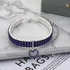Silver collar with blue rhinestones and a heart pendant for dogs or cats