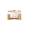 Marbled ceramic double pet bowl set with a pink and white marble bowl and a wooden stand