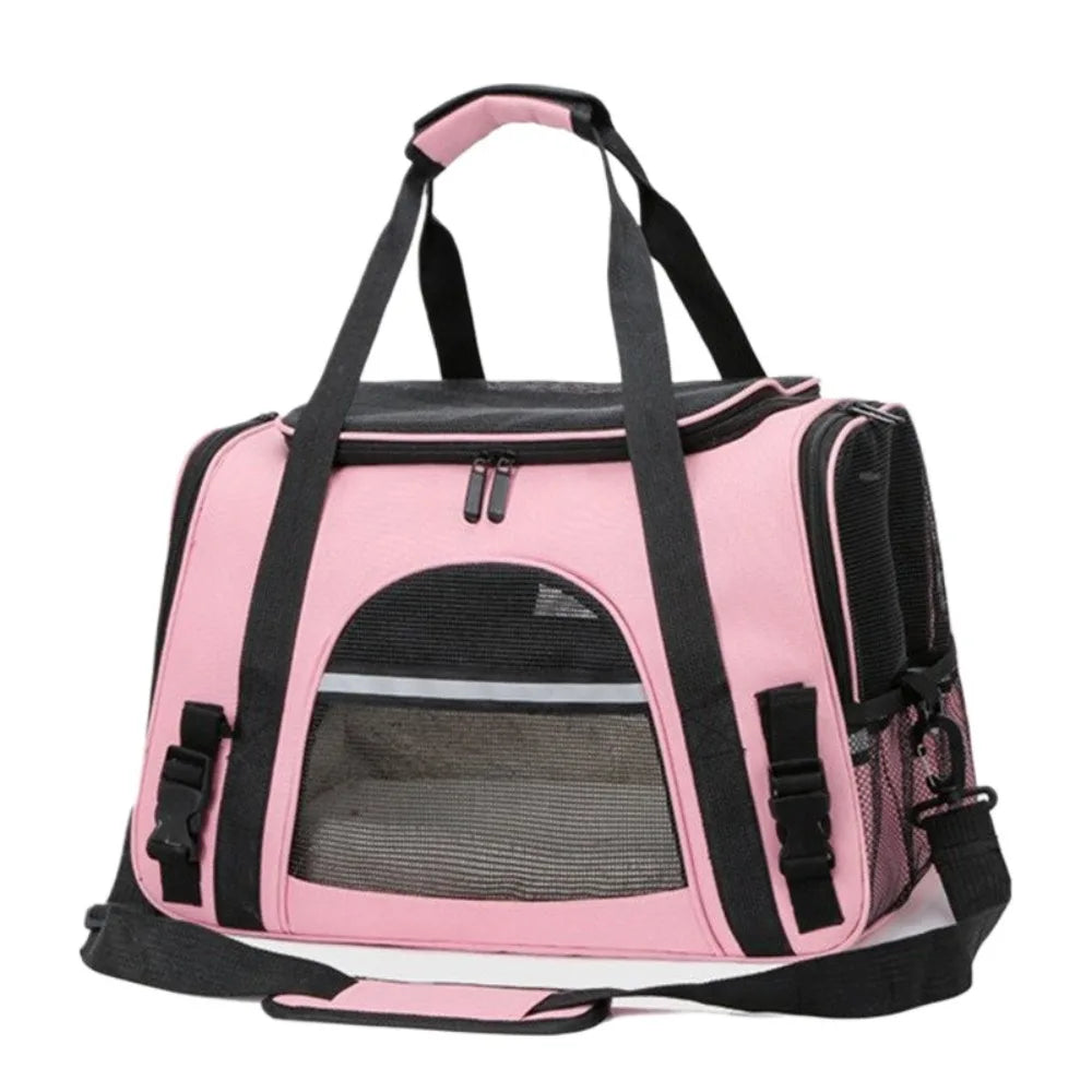 Pink and black foldable pet travel carrier bag with a breathable mesh window.