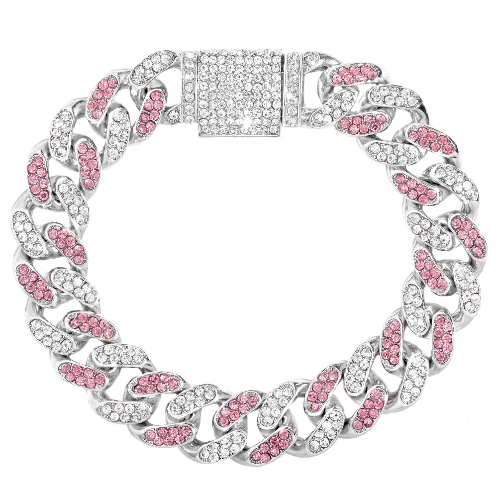 A silver iced-out Cuban link bracelet featuring pink and clear rhinestones.