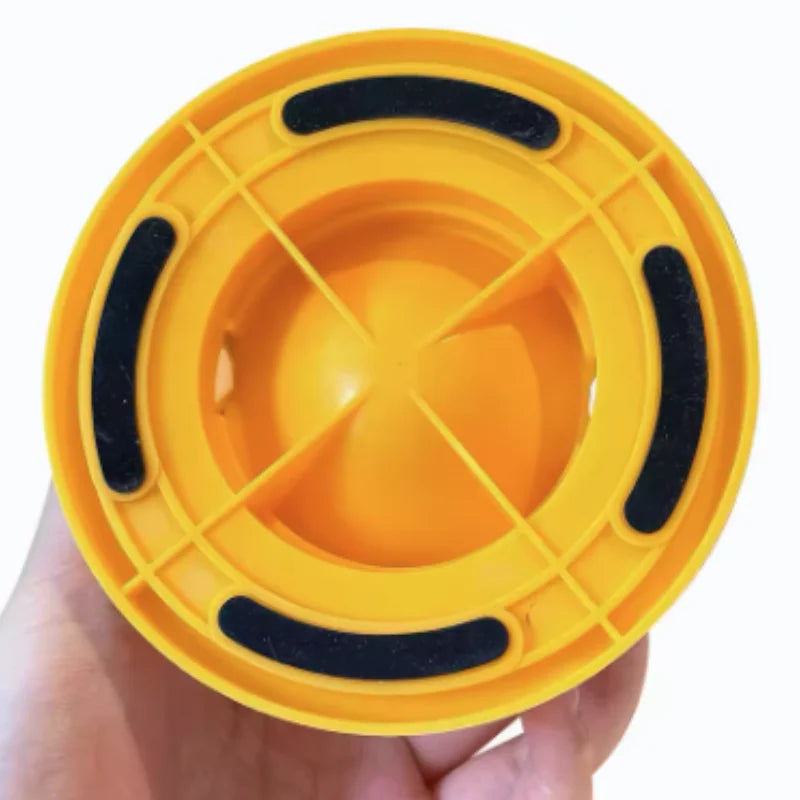 Yellow plastic slow feeder mat with black ridges for dog or cat feeding