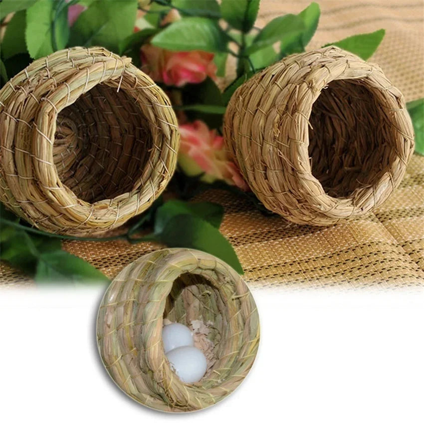 Handwoven straw bird nest for small birds shown in natural woven material on a burlap background.