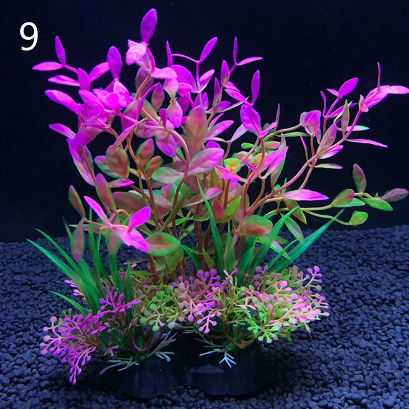 Una vibrante composición de plantas acuáticas artificiales con follaje rosa y morado.