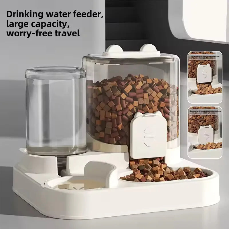 A clear plastic pet feeder and water dispenser set for cats and small dogs with dry food visible inside.