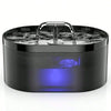 A black automatic cat water fountain with a glowing blue light and a clear water basin.
