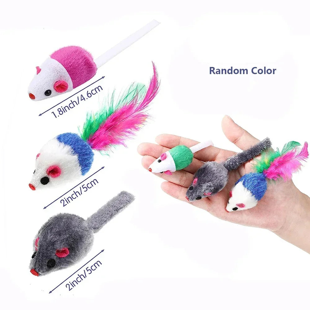 A hand holds several cat mice toys made of faux fur with various colors and a rattle.