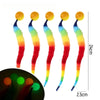 Five colorful caterpillar toys with bouncing balls shown against a dark background.