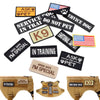 A set of personalized tactical patches featuring text like ASK TO PET and IN TRAINING for dog gear.