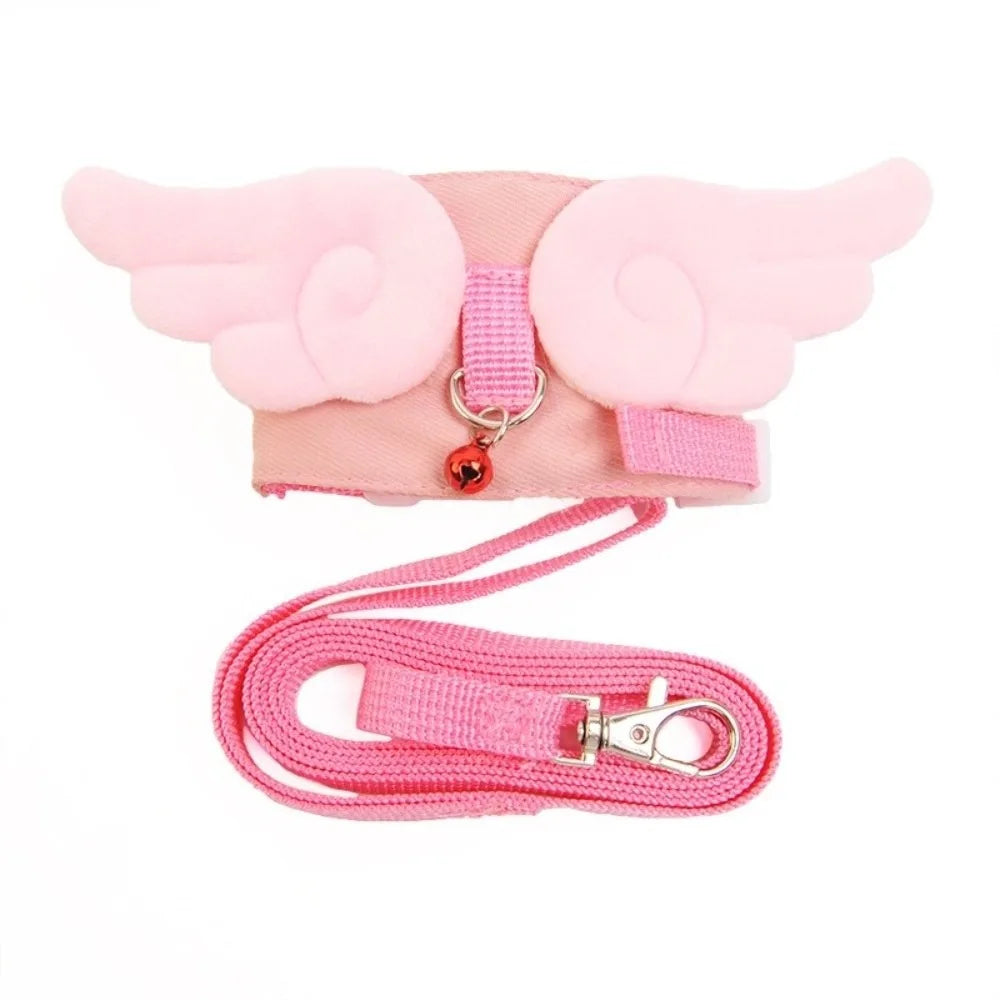 Pink cartoon escape-proof pet harness with a pink leash and charm