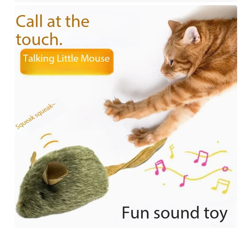 A fluffy orange cat is interacting with a green squeaky mouse toy.
