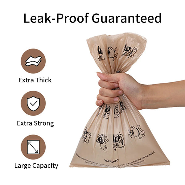 A hand is holding a brown, thick, leak-proof bag of coffee-scented dog waste bags.