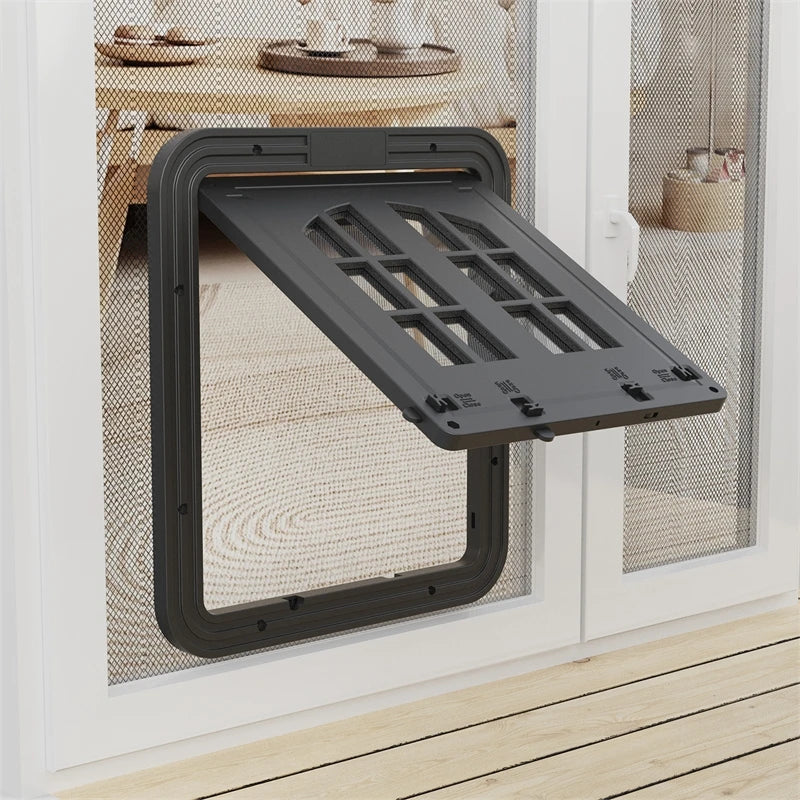 A dark gray magnetic mesh screen door with a self-closing pet flap is shown mounted in a white frame.