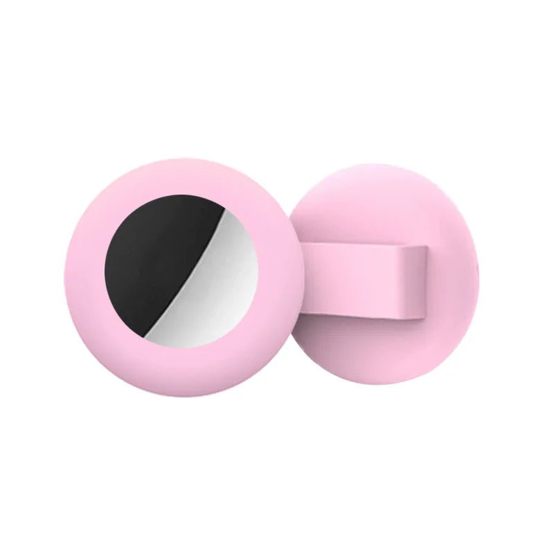 Pink silicone collar holder for pets featuring a circular design with a reflective surface.