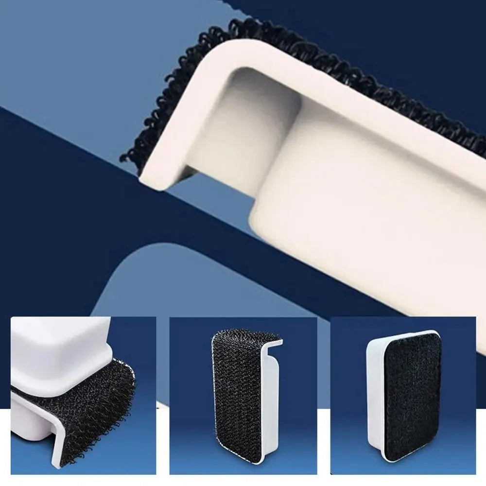 Brosse magnétique blanche et noire pour nettoyer le coin supérieur d'un aquarium.