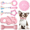 Pink rubber chew toys and dental cleaning brushes for small dogs