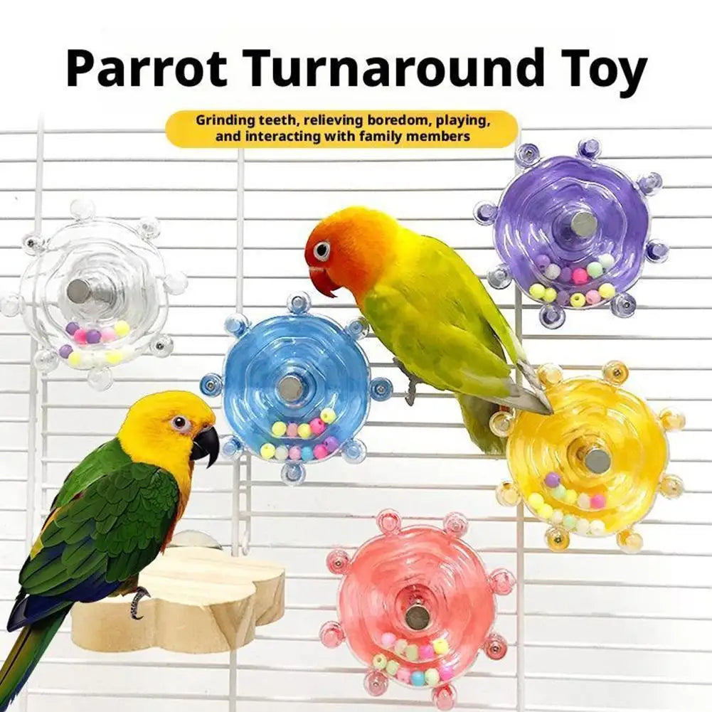 A collection of colorful parrot turnaround toys including a yellow, green, and orange bird figure and several rotating plasti