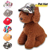 A brown dog plush toy wearing a camouflage pet hat.